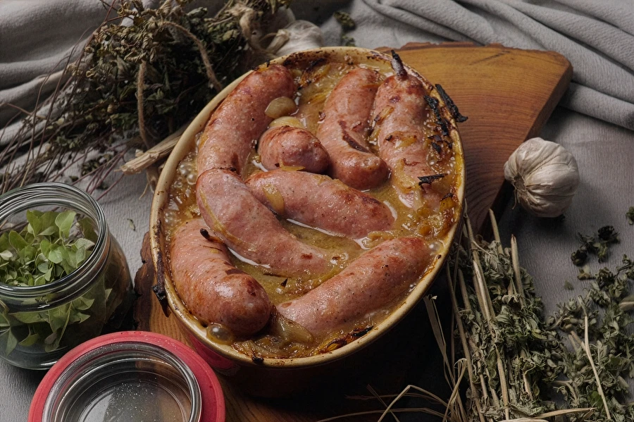 Browin Przepiśnik - Salsiccia bianca al forno con birra, senape e cipolle